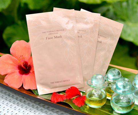 packages of galangal facial mask and aroma oil