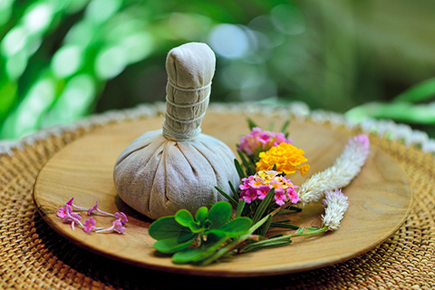 packages of galangal facial mask and aroma oil
